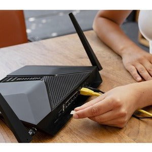 Netgear Nighthawk AX4 LAX20 Wi-Fi 6 IEEE 802.11ax 1 SIM Cellular, Ethernet Modem/Wireless Router - 4G - LTE - Dual Band - 2.40 GHz ISM Band - 5 GHz UNII Band - 2 x Antenna(2 x External) - 230.40 MB/s Wireless Speed - 4 x Network Port - 1 x Broadband Port IM5086866