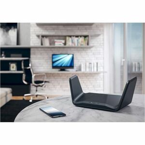 Netgear Nighthawk RAXE300 Wi-Fi 6E IEEE 802.11 a/b/g/n/ac/ax Ethernet Wireless Router - Tri Band - 2.40 GHz ISM Band - 5 GHz UNII Band - 6 x Antenna(6 x Internal) - 998.40 MB/s Wireless Speed - 5 x Network Port - 1 x Broadband Port - USB - 2.5 Gigabit Eth IM5717813